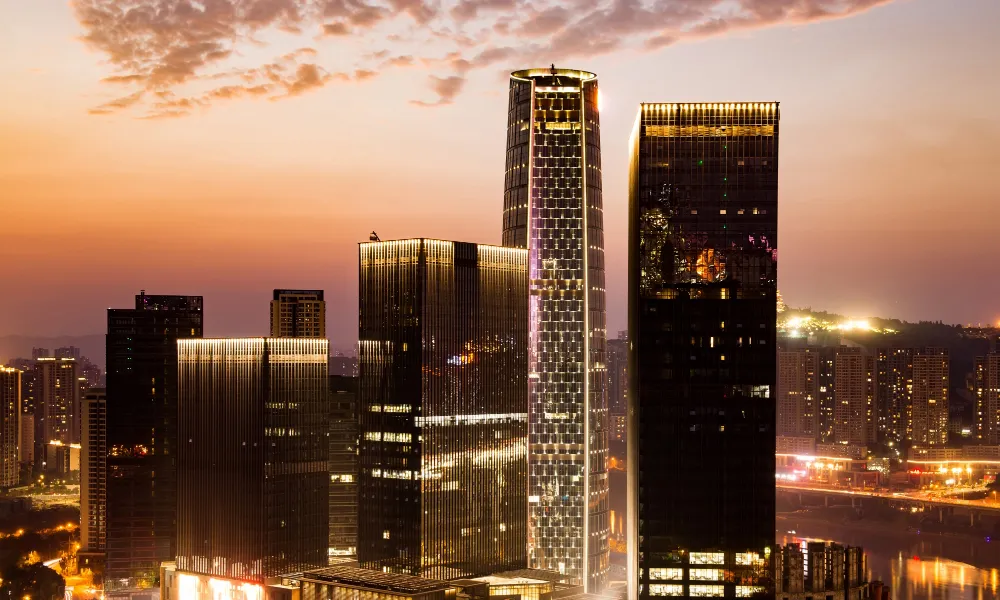 Modern city skyline at sunset