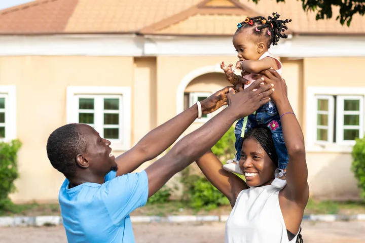 Happy family in their new home